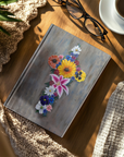 hardcover art journal with the painting Cross in Bloom by Kris Horton on the front cover