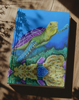 Journal with Sea of Colors on the cover a painting of a sea turtle by Kris Horton