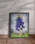 Framed Texas Bloom No. 1 painting by Kris Horton leaning against a wall.