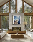 Framed painting by Kris Horton of a bobcat looking up into the sun in a modern cathedral style living room.