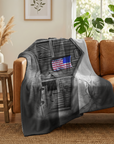 My America painting by Kris Horton printed on a fleece blanket draped over a leather couch