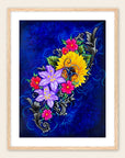 Framed artwork by Kris Horton of colorful flowers on a blue background