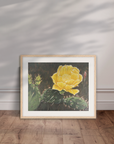 oak frame around the painting of a cactus bloom by Kris Horton