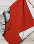 Blanket corner with poppy ink drawing with red background by Kris Horton