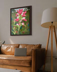 Texas Bloom No. 2 an Indian Paintbrush painting by Kris Horton framed and hanging above leather sofa.