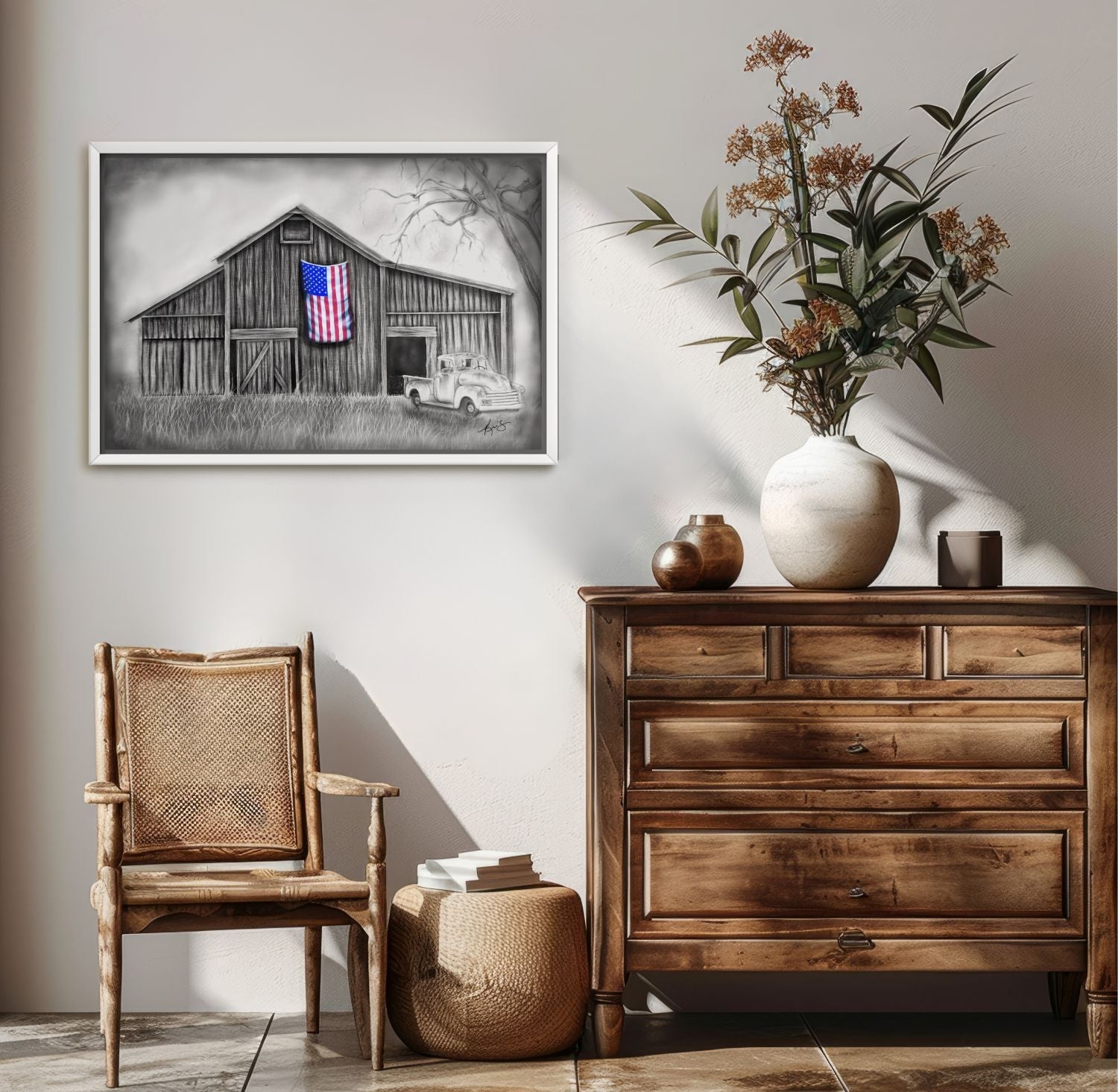 Painting by Kris Horton, My America, a black and white of a barn and old truck with an American flag in color, hanging on a wall in an entry way.