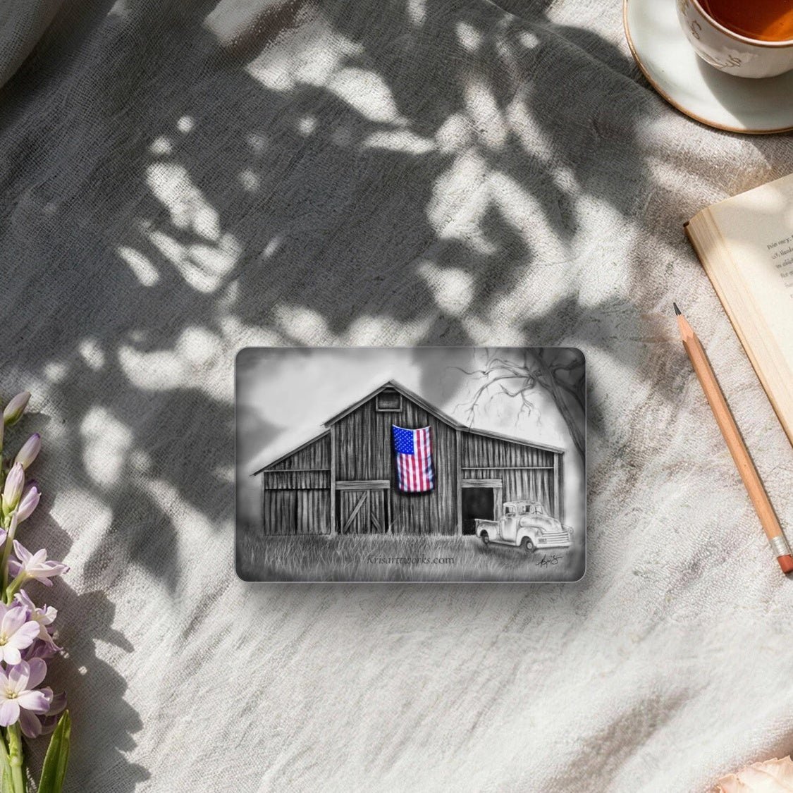 Magnet with the painting My America on it by Kris Horton, an old barn and truck in black & white with an American flag in color.