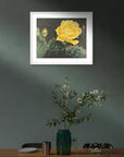 framed artwork of a cactus bloom painting by Kris Horton above a dinning room table