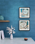 Soft Bloom abstract floral print set by Kris Horton framed on blue wall