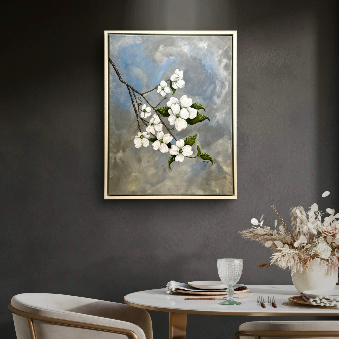 The Dogwood painting by Kris Horton framed hanging above a kitchen table.