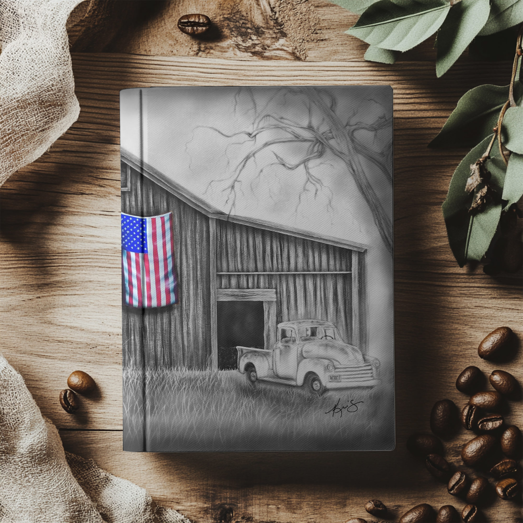 hard cover journal with painting of an old barn and truck with an american flag painting on the cover by Kris Horton