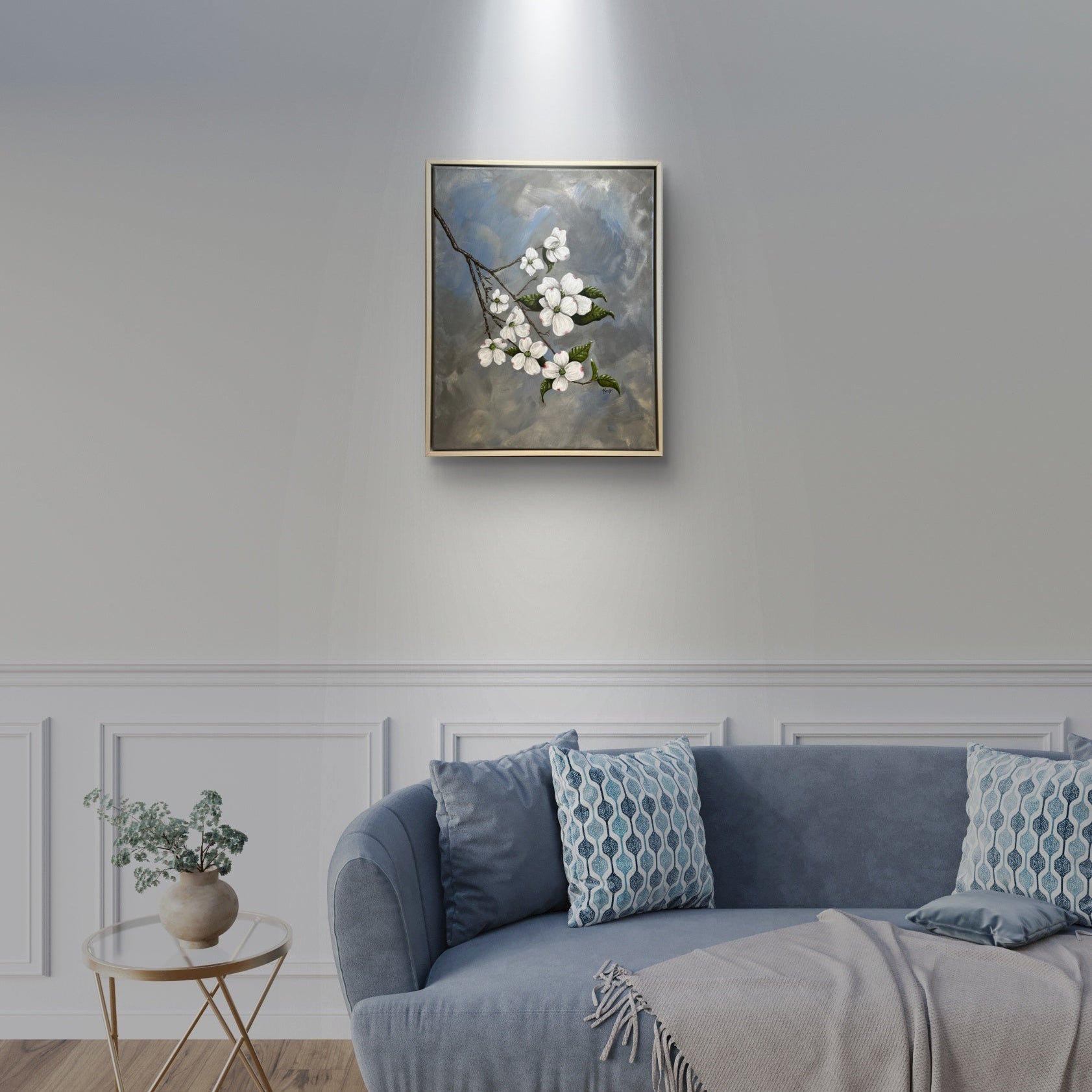 Original painting of a dogwood branch and flowers with an abstract background hanging above a couch