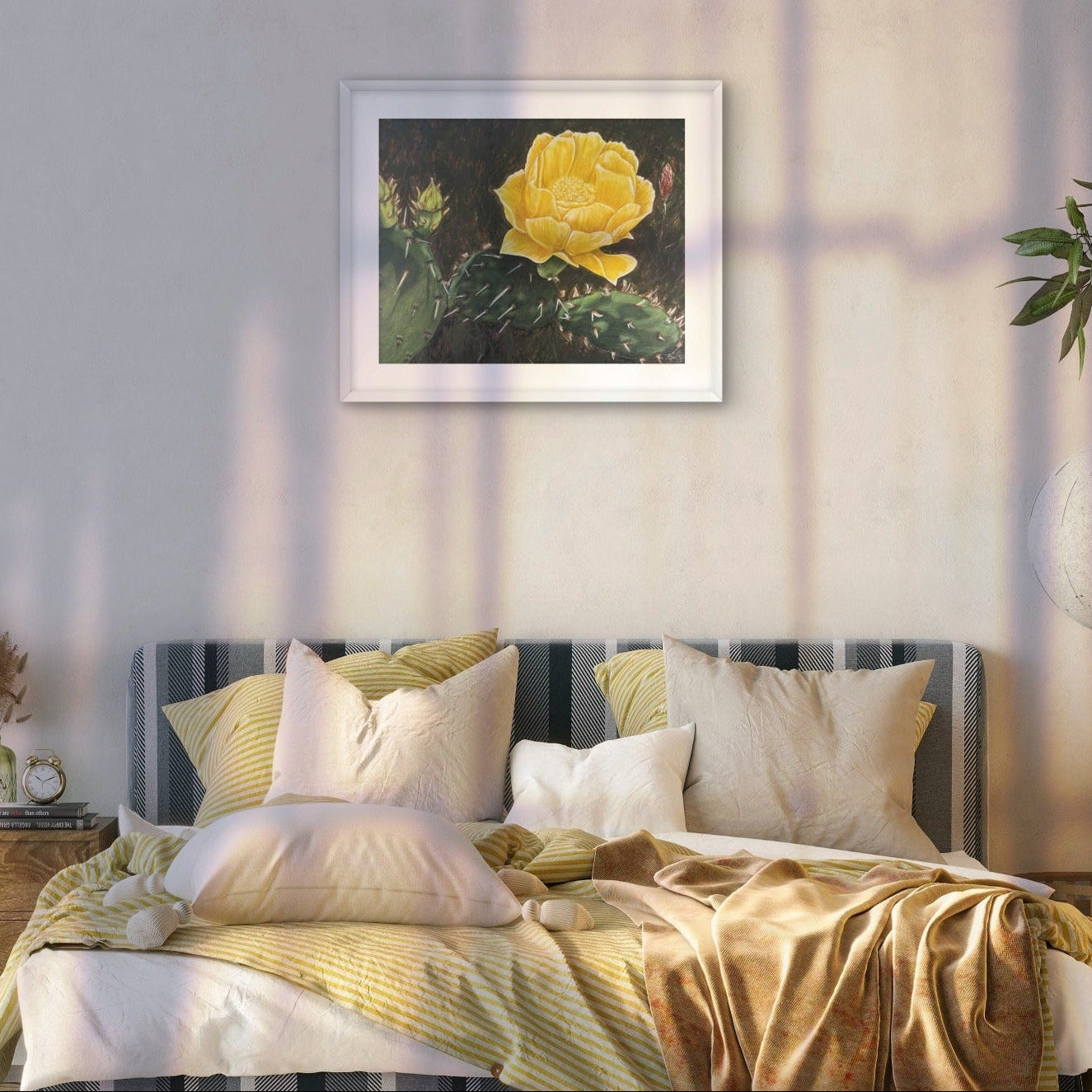 Framed painting by Kris Horton, Beauty among thorns, hanging above a modern bed