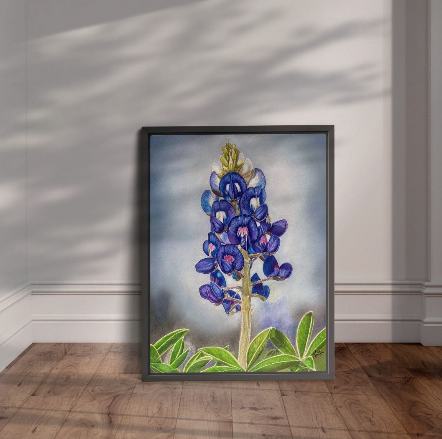Framed Texas Bloom No. 1 leaning against a wall.
