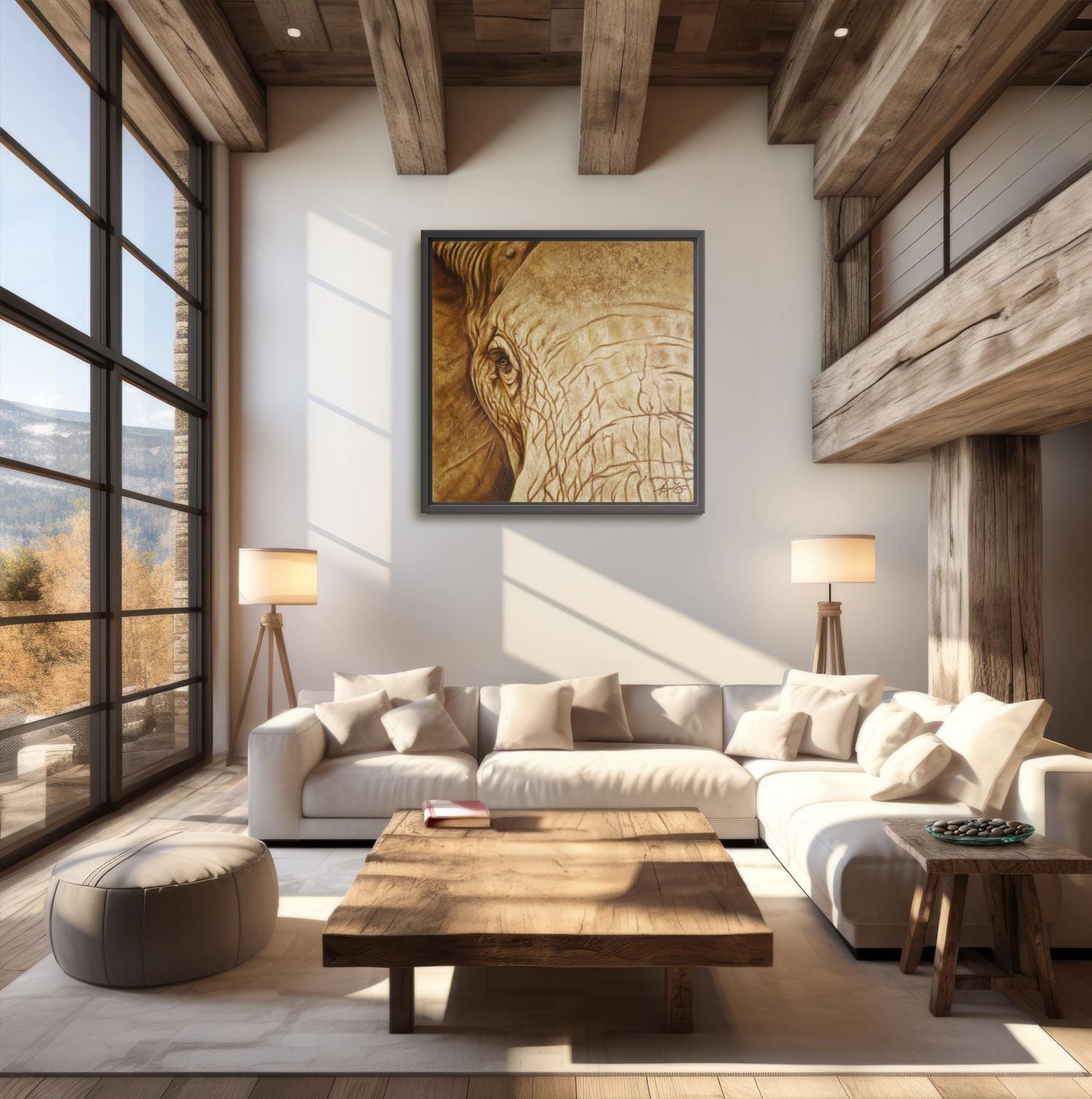 Framed Strength & Honor painting of a close up of an elephants face in a modern living room with wooden beams, and large windows.