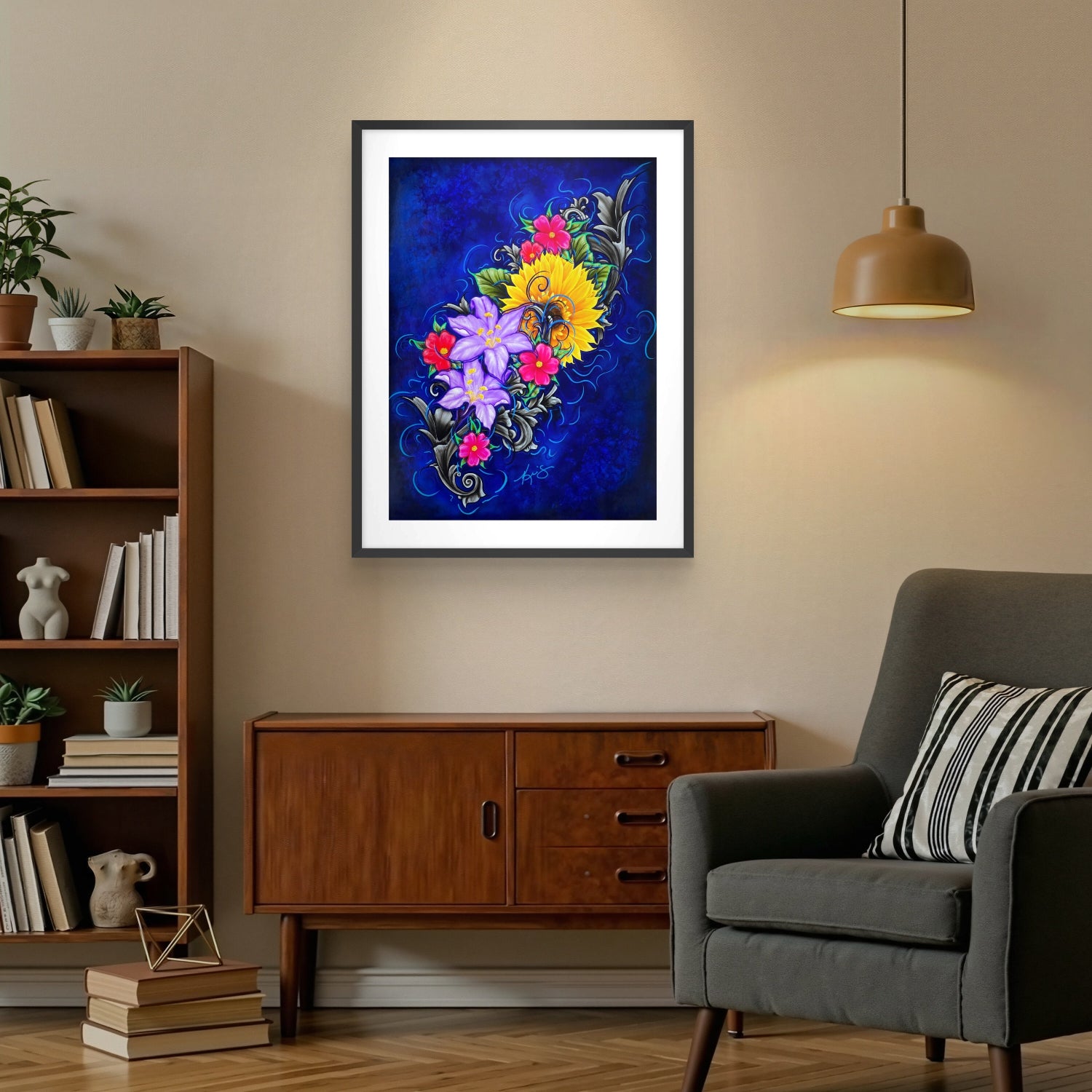 Framed floral painting on a wall in a living room with a bookshelf and chair.