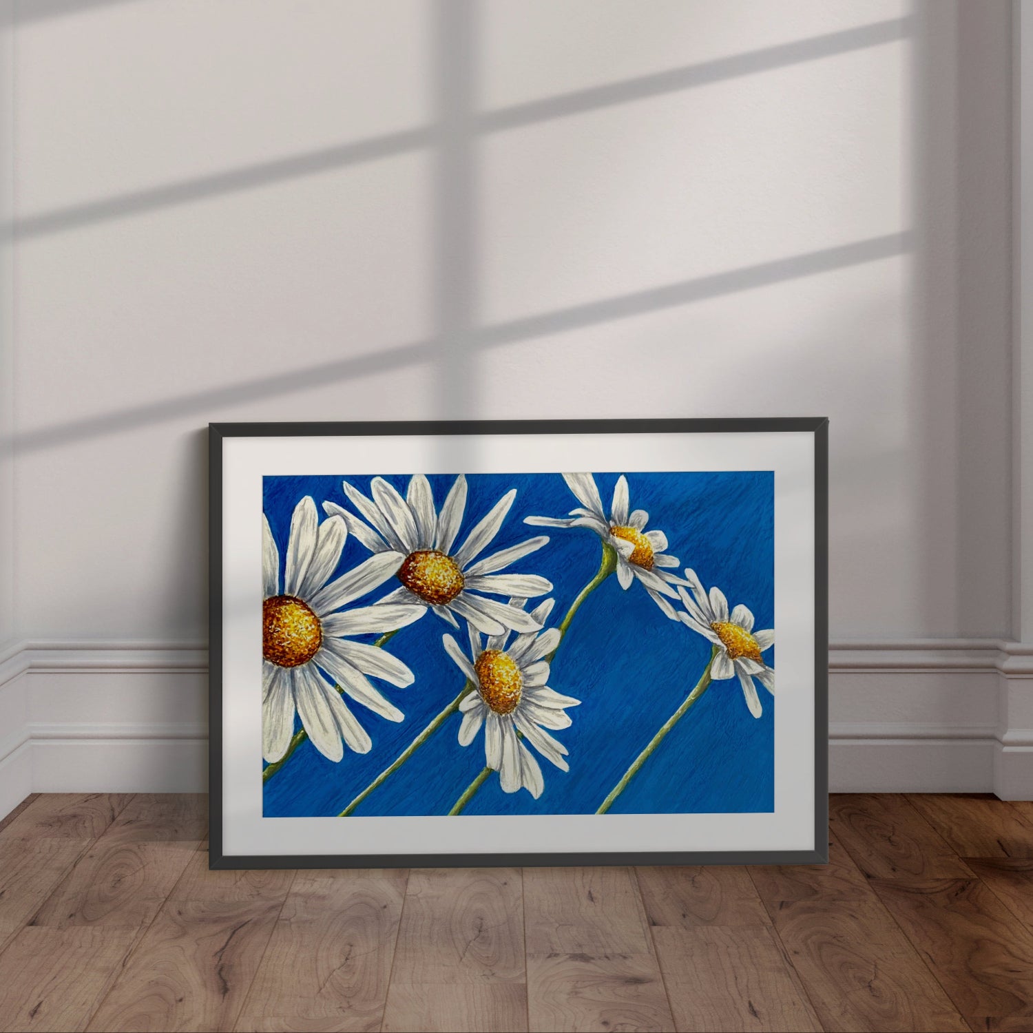 Black framed Daisy days painting which is a daisy painting with blue abstract background