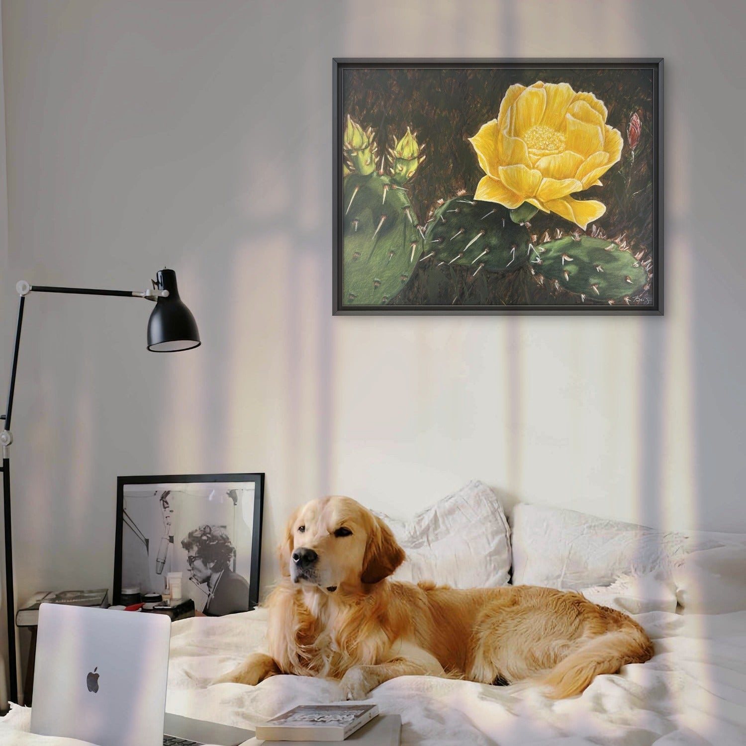 Canvas fine art print of a cactus bloom painting by Kris Horton in a bedroom