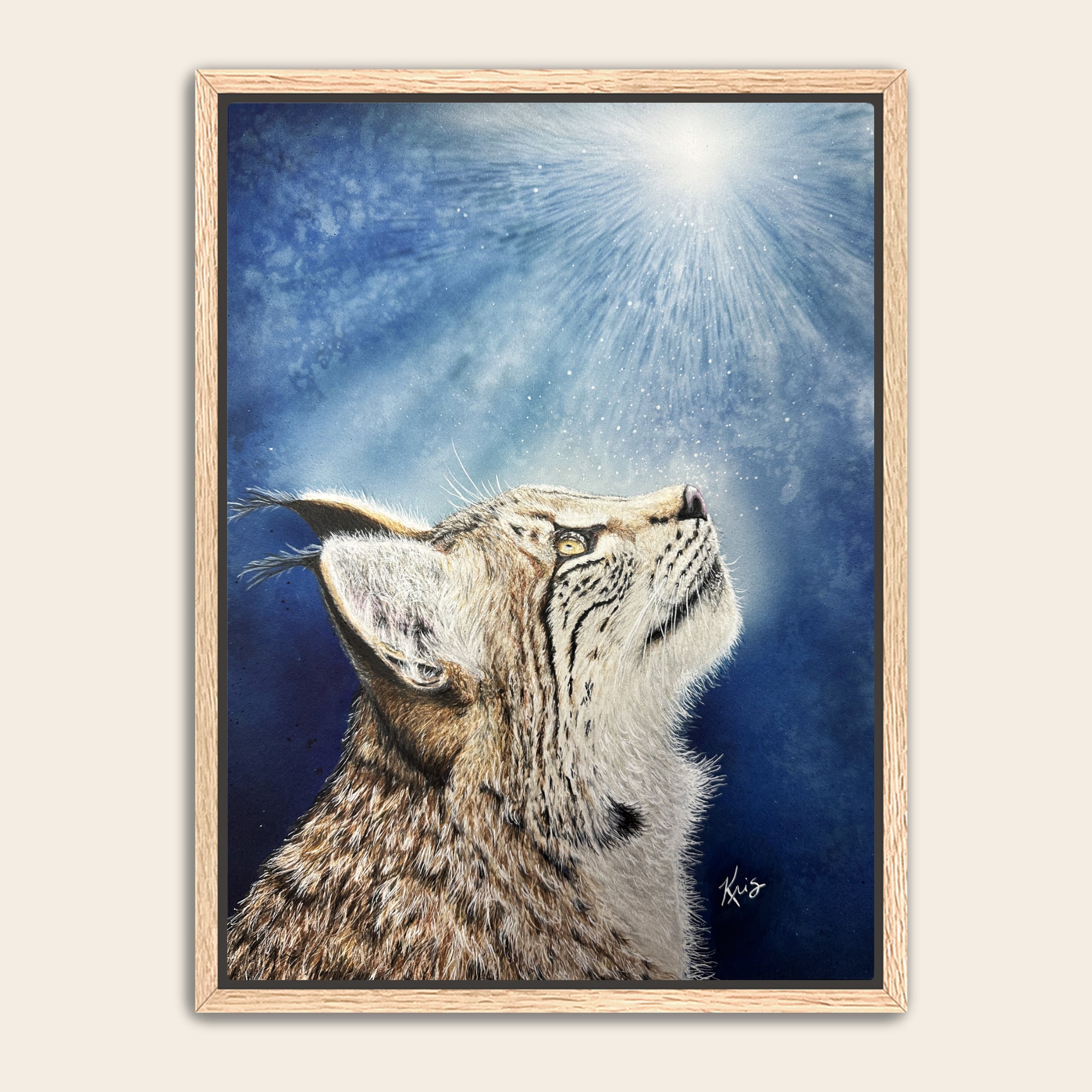 Framed artwork of a bobcat looking upwards against a blue background