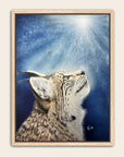 Framed artwork by Kris Horton of a bobcat looking upwards against a blue background