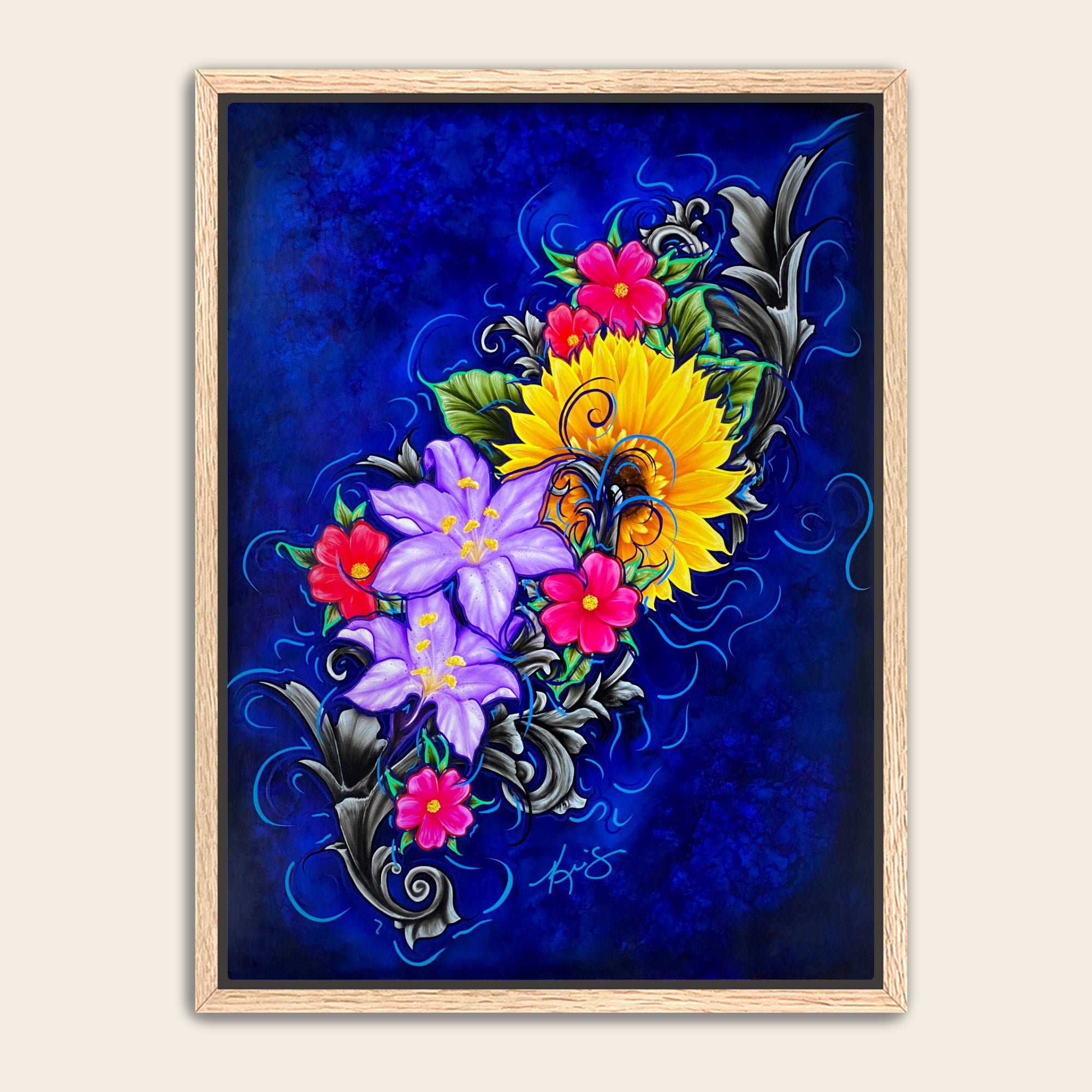 Framed artwork of colorful flowers on a blue background