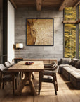 Framed wall art by Kris Horton of a close up of an elephants eye hanging in a modern living room with large windows with scenic view.