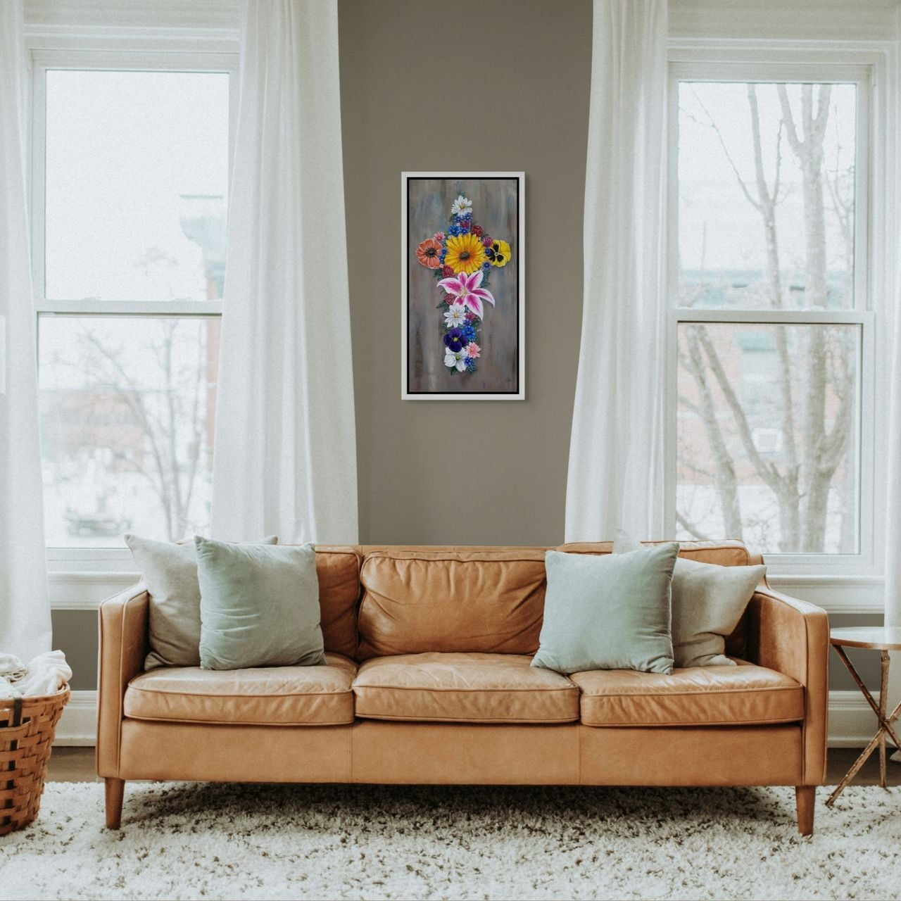 Floral cross painting by Kris Horton framed canvas print, hanging on wall in living room.