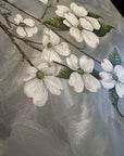 Close angle of The Dogwood painting by Kris Horton of dogwood flowers on a metallic gray and blue background.
