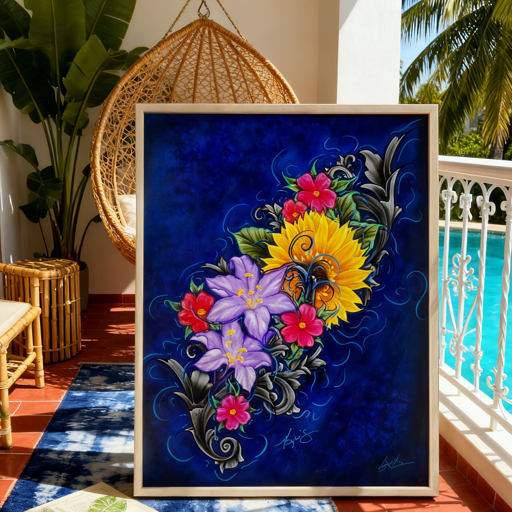 Framed artwork by Kris Horton, of colorful flowers on a patio near a pool.