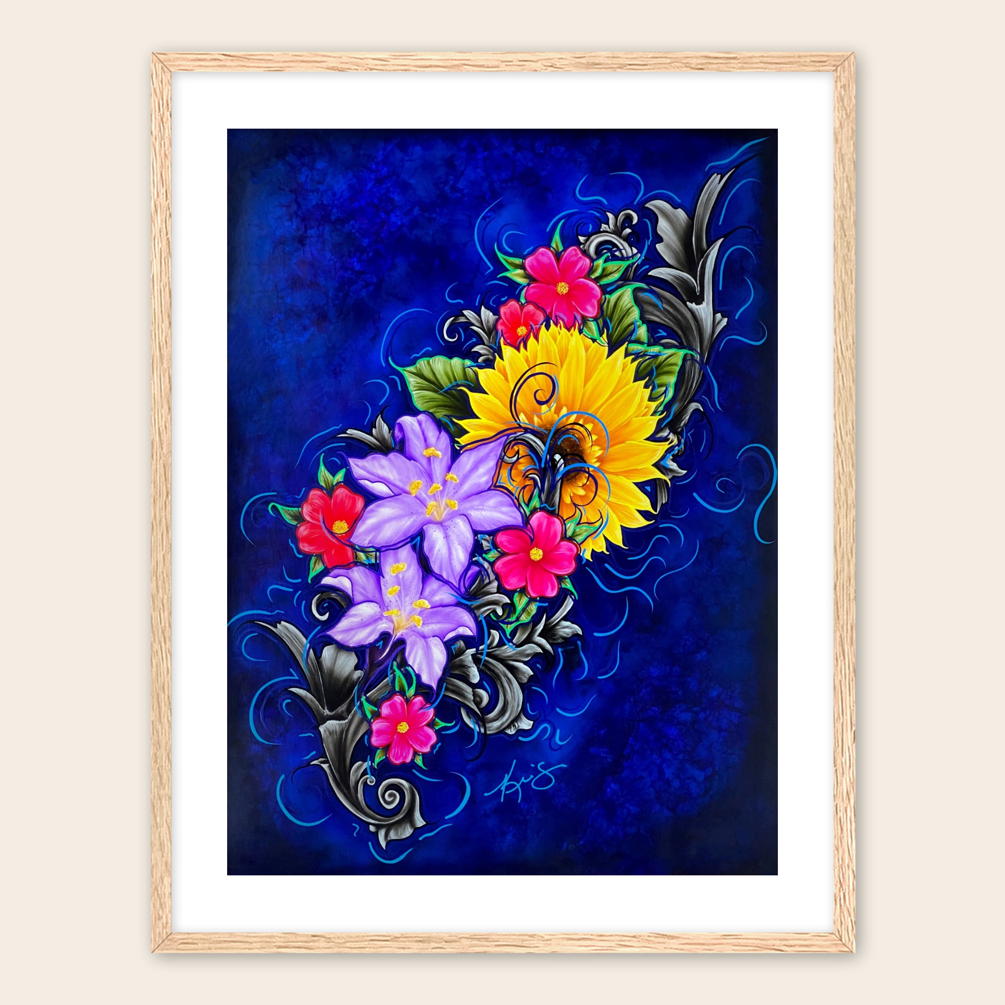 Framed artwork of colorful flowers on a blue background
