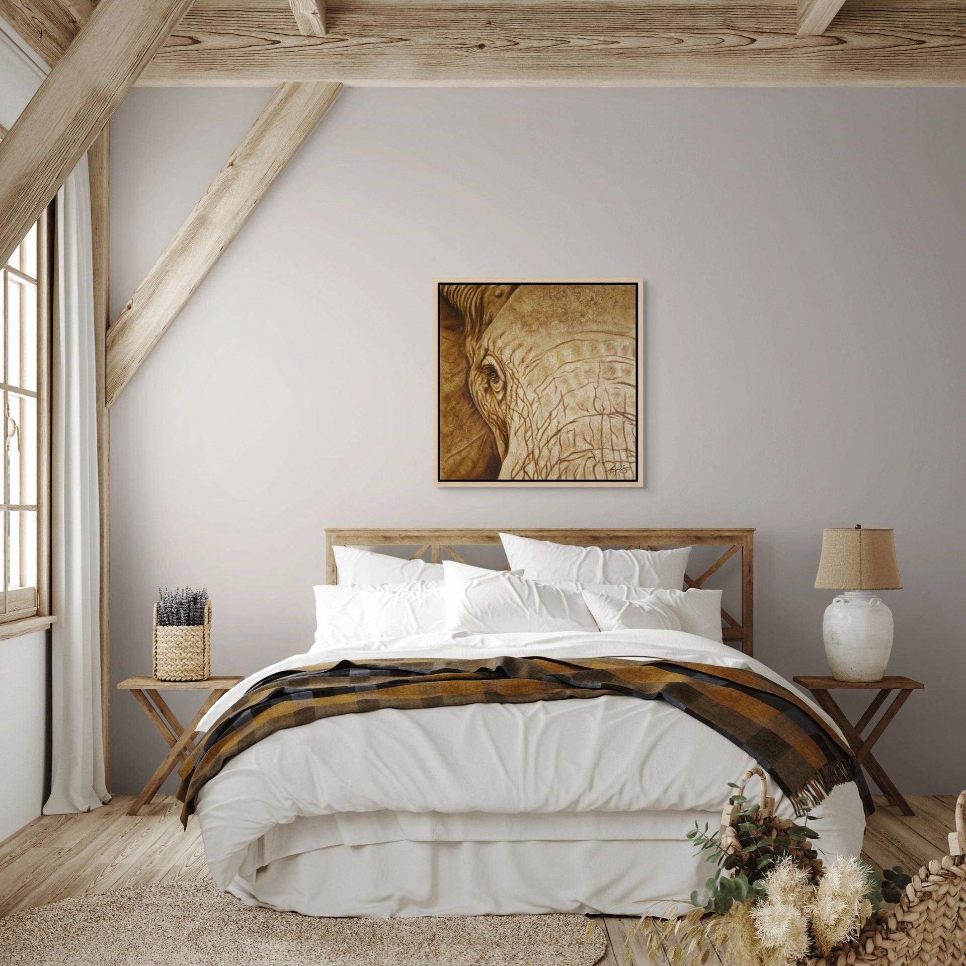 Strength & honor painting by Kris Horton hanging on a wall above a bed