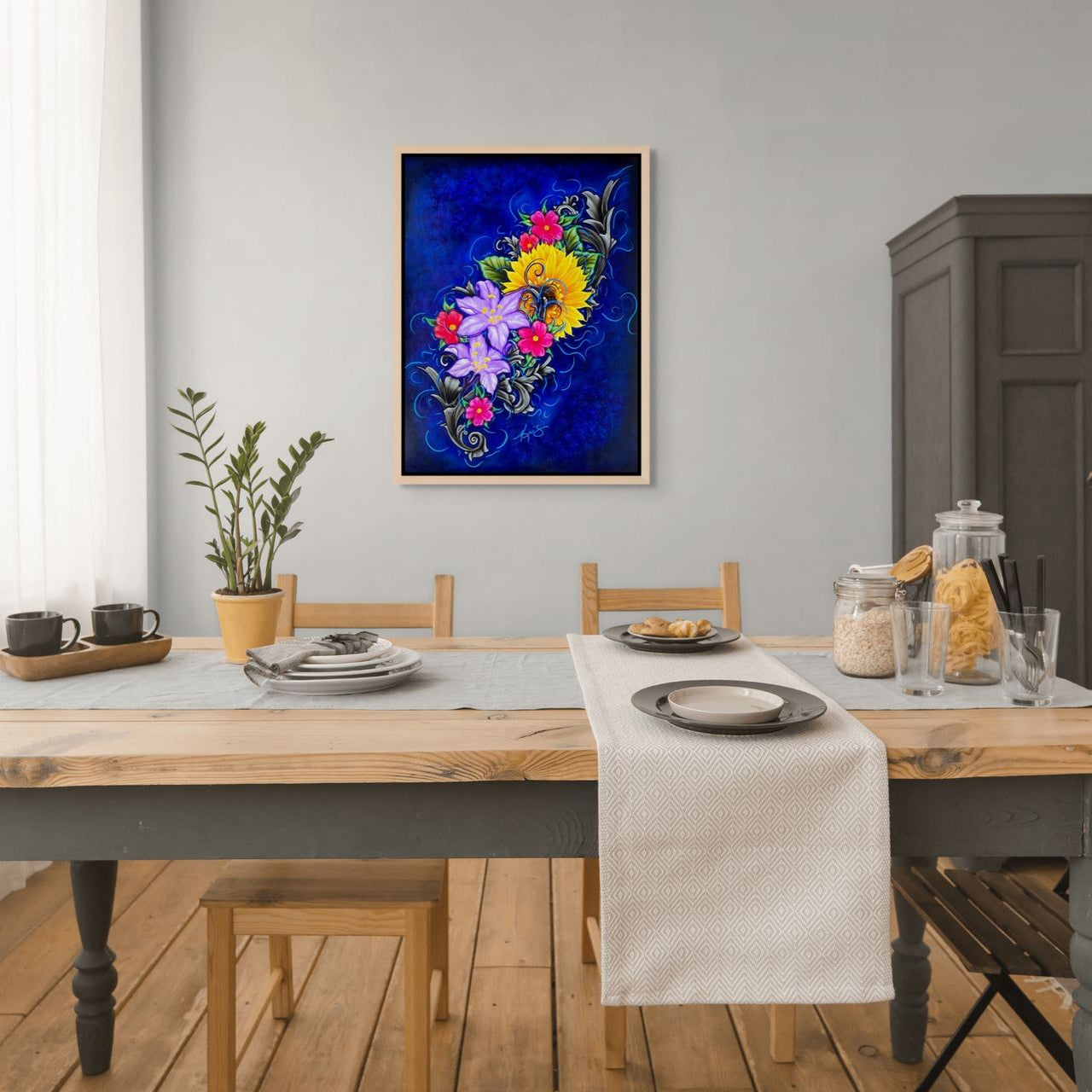The Color of Happiness framed canvas print, a vibrant floral painting by Kris Horton hanging in a kitchen.
