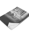 Blanket with a black and white illustration of a vintage truck on a white background