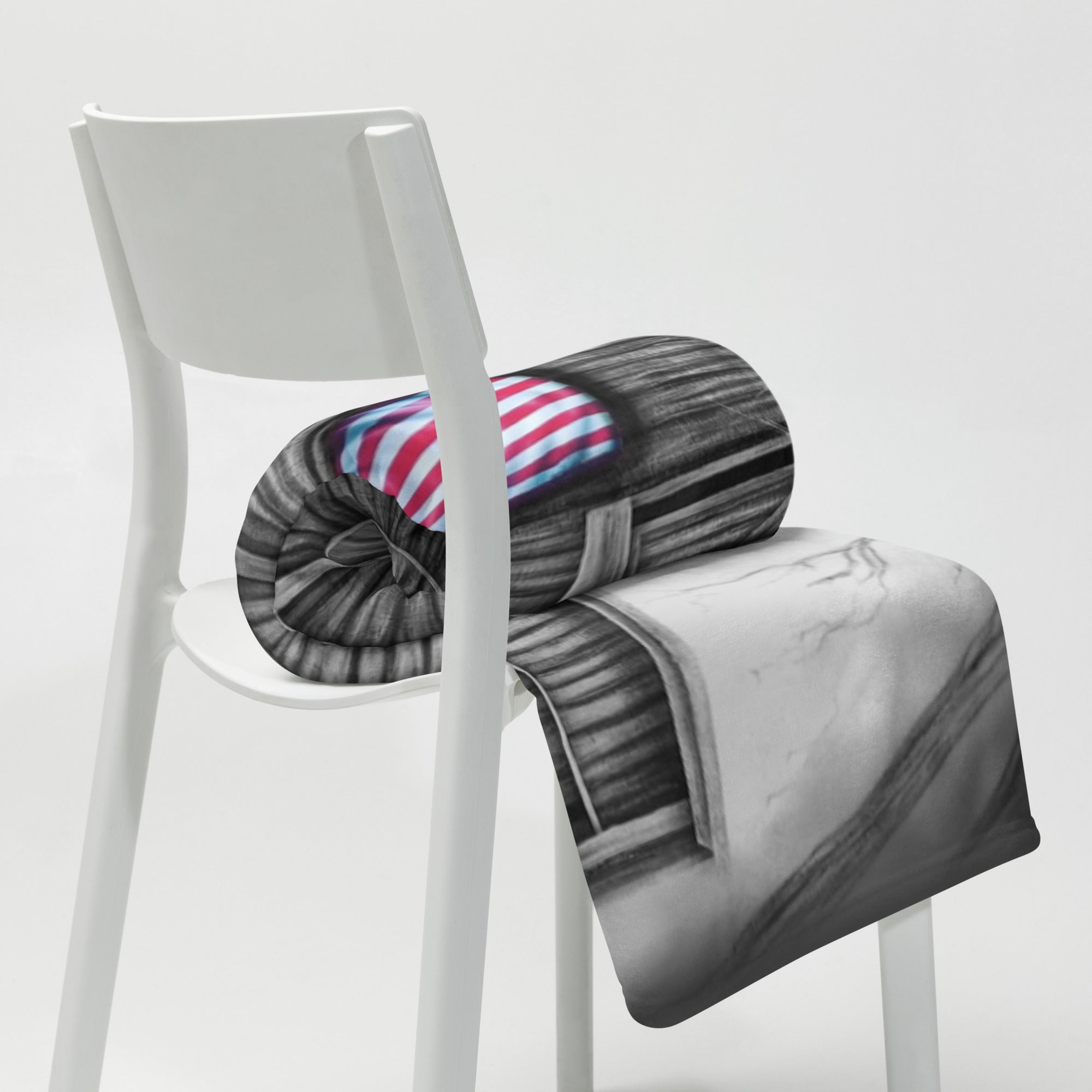 Rolled up blanket with My America painting by Kris Horton