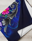 Blanket corner with the painting of The Color of Happiness on it